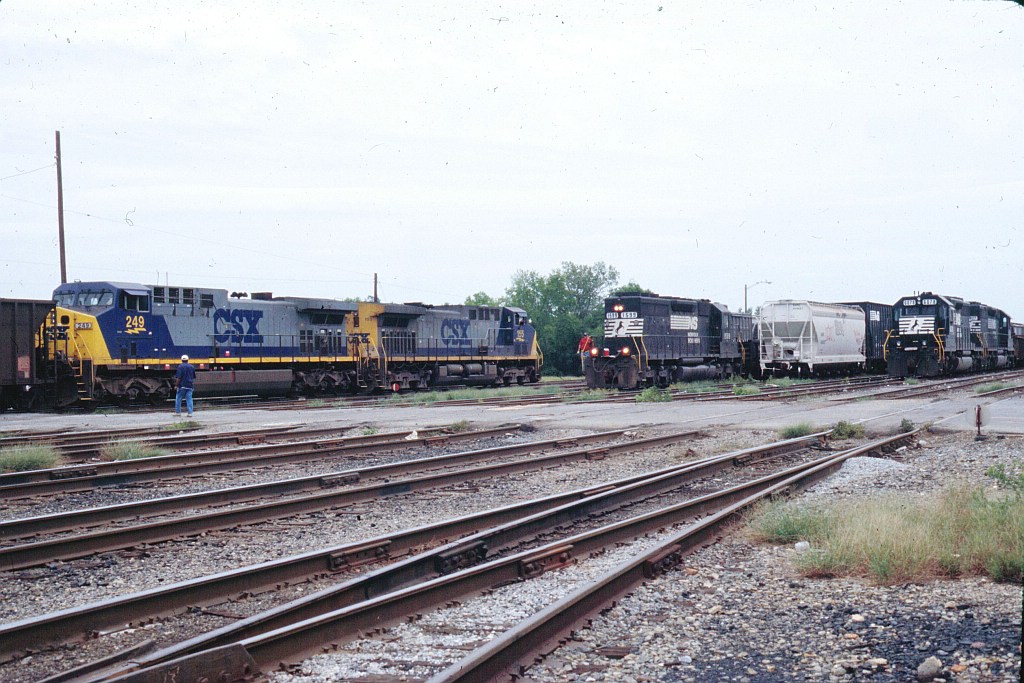 Radium Springs Coal train going through NS yard under the watchful eye of the competition